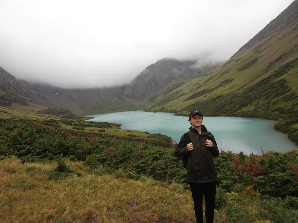 A photo of me--Connor--along the Iceberg Lake Trail at Glacier National Park.